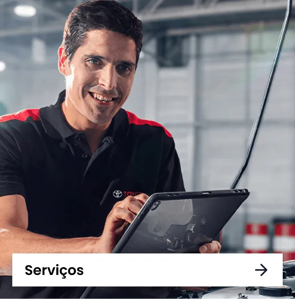 Imagem de um mecânico sorrindo.